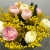 Букет "Маффин" из ранункулюсов и мимозы в Клину