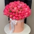 Композиция в шляпной коробке из 113 пионов Корал Шарм в Клину