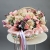 Композиция в корзине "Диодора" из французских роз Квиксенд, диантусов и кустовых пионовидных роз Бомбастик в Клину